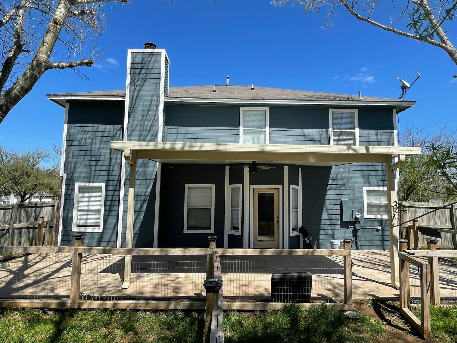 Two-story home with painted horizontal siding